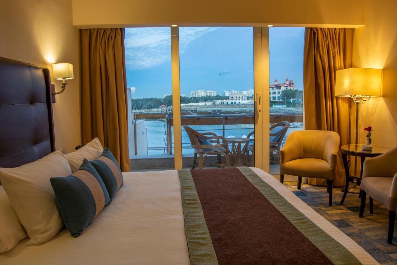 Helnan Royal Palestine Hotel - Montazah Gardens 亚历山大港 外观 照片 A room at the hotel